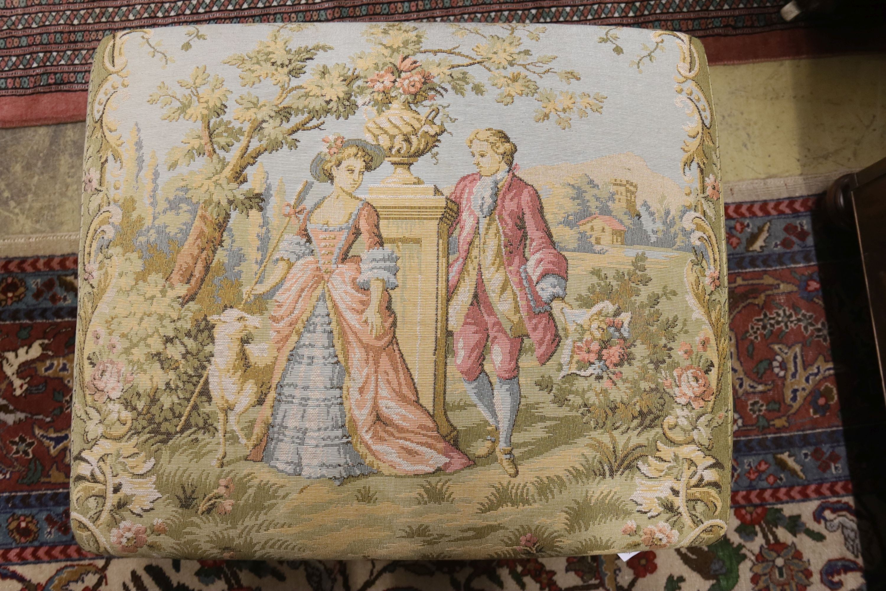 An 18th century style rectangular giltwood dressing stool with tapestry seat